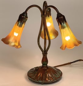 A TIFFANY STYLE LILY DESK LAMP