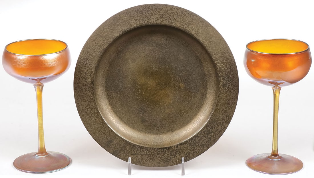 L.C. TIFFANY FAVRILE GLASS & BRONZE GROUP: L.C. TIFFANY FAVRILE GLASS & BRONZE GROUP. Comprising three individual items, including a matching pair of goblets, underside marked L.C.T. Favrile and model #1166, height 6 inches, diameter 3 inches,