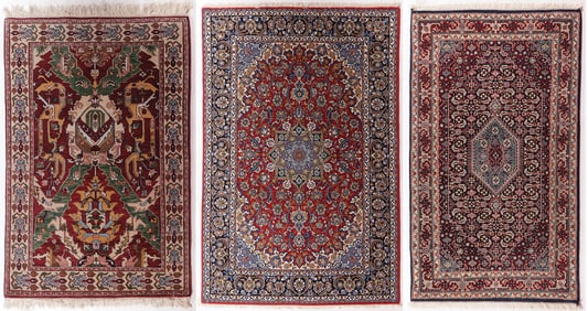 THREE ORIENTAL RUGS