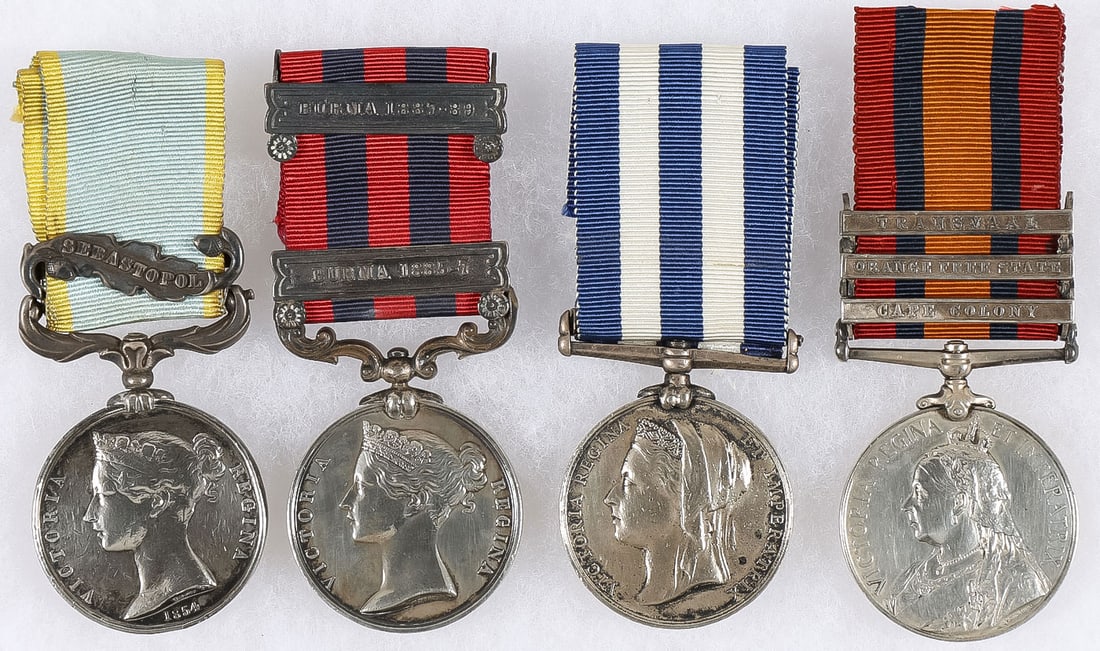 4 GOOD BRITISH VICTORIAN NAMED MEDALS: 4 GOOD BRITISH VICTORIAN NAMED MEDALS. Comprising from left to right a Crimea medal with Sebastopol clasp and named to T. HOLMEN. An Indian General Service medal with Burma 1885-7 and Burma 1887-89 cl