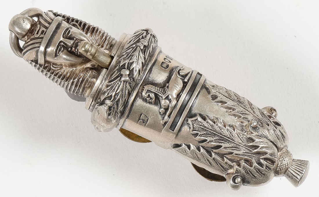 SILVER SCOTTISH RIFLES OFFICERS WHISTLE, 1882: SILVER SCOTTISH RIFLES OFFICERS WHISTLE, 1882. Comprising a beautifully crafted and highly detailed silver Cameronians (Scottish Rifles) officers cross belt whistle with screw out sphinx head whistle