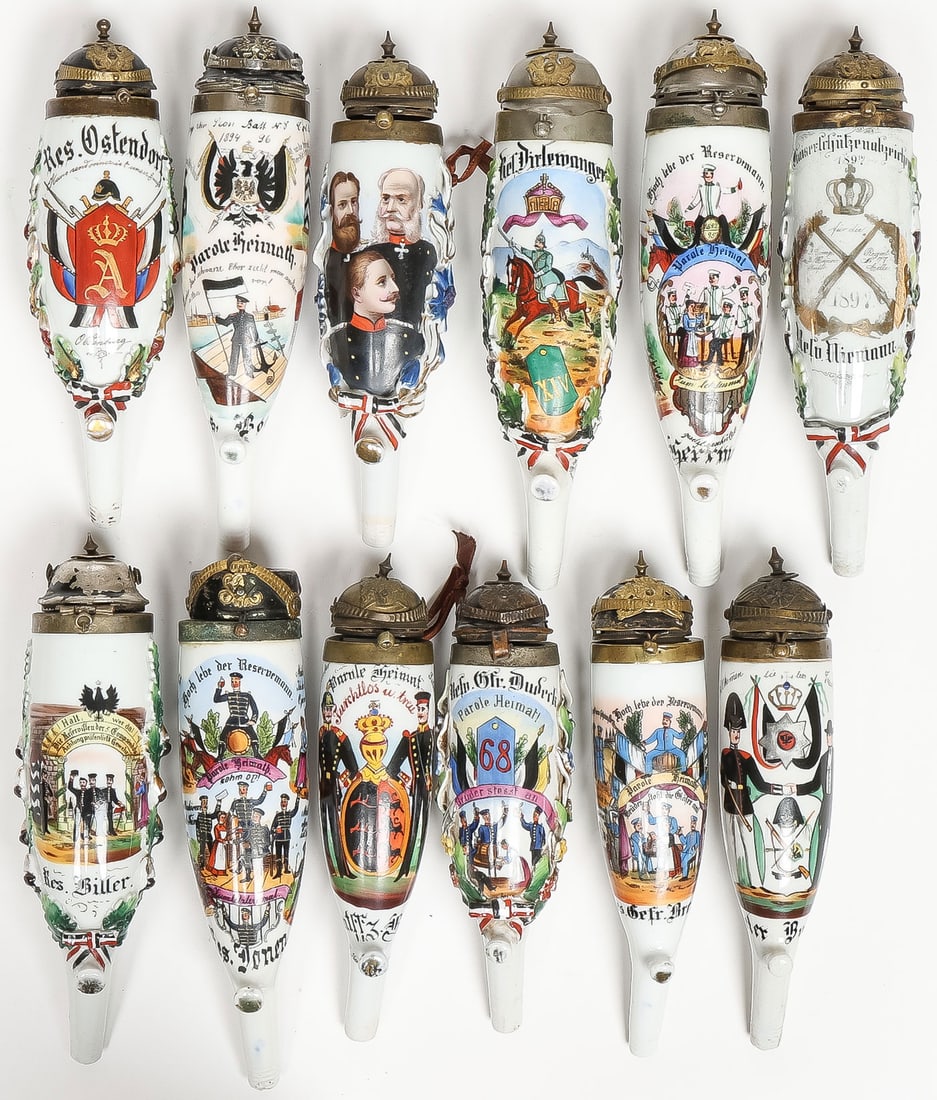 12 IMPERIAL GERMAN PORCELAIN RESERVIST PIPE BOWLS: 12 IMPERIAL GERMAN PORCELAIN RESERVIST PIPE BOWLS. Comprising 12 individual hand-painted reservist pipe bowls, each depicting a specialty, unit, or regiment. Most are named, and each with pickelhaube