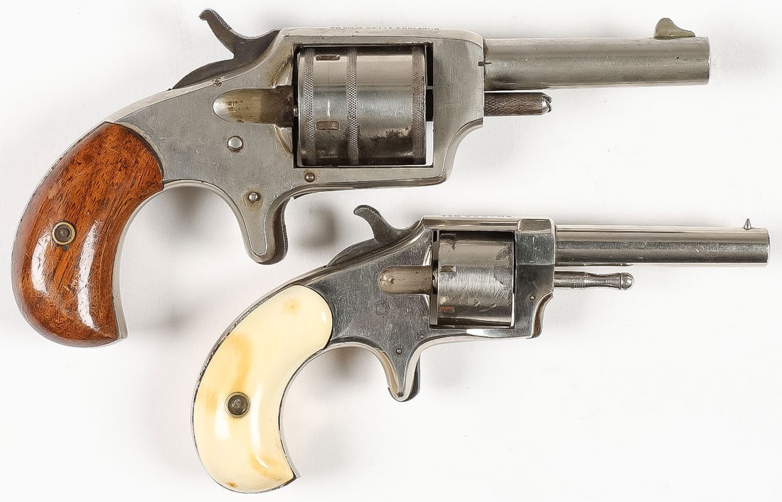 PAIR OF VINTAGE SPUR TRIGGER REVOLVERS 19TH C: PAIR OF VINTAGE SPUR TRIGGER REVOLVERS 19TH C. Comprising a Hopkins & Allen "Dictator" .32 caliber revolver, 2.5-inch round barrel, nickel-plated frame, varnished walnut grips, serial number 5084, cle