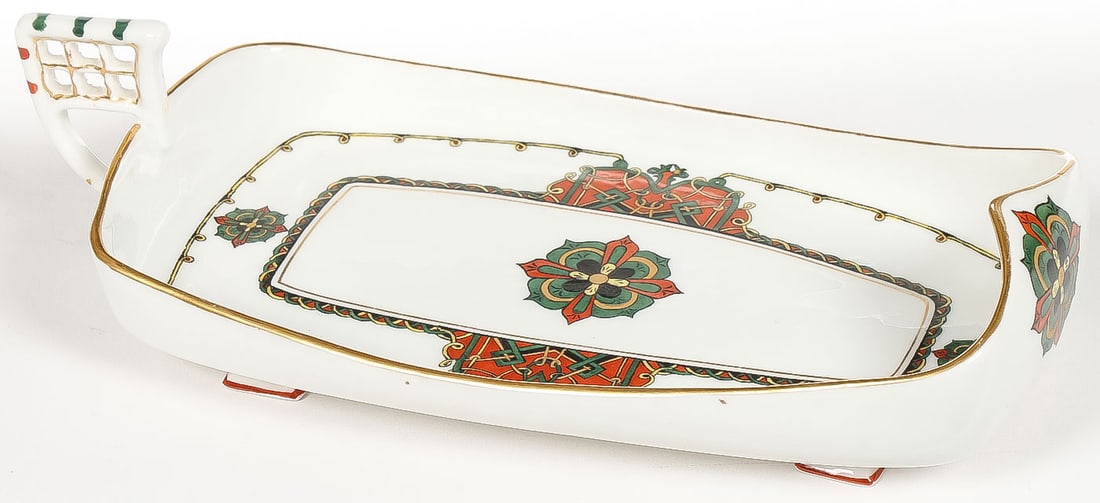 SCARCE RUSSIAN KORNILOV FOOTED KOVSH DISH: SCARCE RUSSIAN KORNILOV FOOTED KOVSH DISH. Comprising a scarcely encountered porcelain dish by Kornilov Bros in the Pan-Slavic taste, circa 1900. Of rectangular form with rounded corners, slightly bow