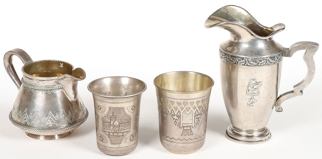4 PIECES OF RUSSIAN SILVER C. 1875 - 1919: 4 PIECES OF RUSSIAN SILVER C. 1875 - 1919. Comprising a charming silver creamer on spread ring foot with beaded banding and engraved Pan Slavic designs, and gilded interior, hallmarked St. Petersburg,