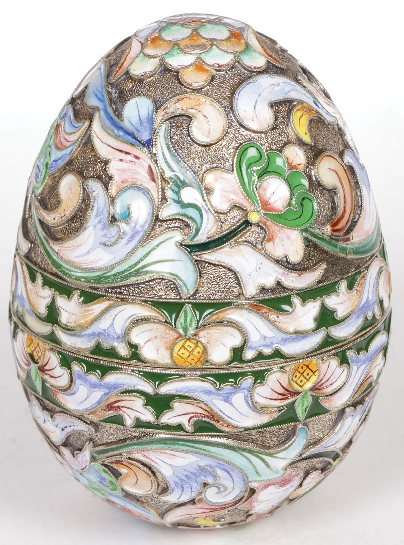 BEAUTIFUL RUSSIAN SILVER & ENAMELED EGG: BEAUTIFUL RUSSIAN SILVER & ENAMELED EGG. Comprising a finely crafted two-piece silver gilt and shaded enamel egg. Overall decorated in shaded enamel florals on a stippled gilt ground. Bears hallmark f