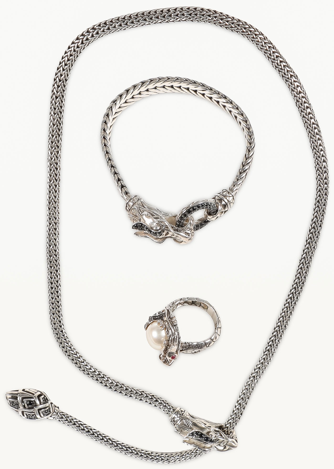 JOHN HARDY STERLING DRAGON NECKLACE, BRACELET: JOHN HARDY STERLING DRAGON NECKLACE, BRACELET & RING. Comprising a matching three-piece suite consisting of a woven sterling silver John Hardy ?Naga' dragon head necklace and bracelet, and a dragon he