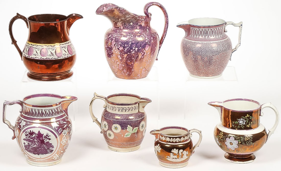 8 PINK LUSTREWARE JUGS: 8 PINK LUSTREWARE JUGS. Comprising a good group of English pink and copper Lustreware jugs, circa 1810-1830, in various shapes and sizes, as shown. Greatest height 8.5 inches. SHIPPING NOTICE: If