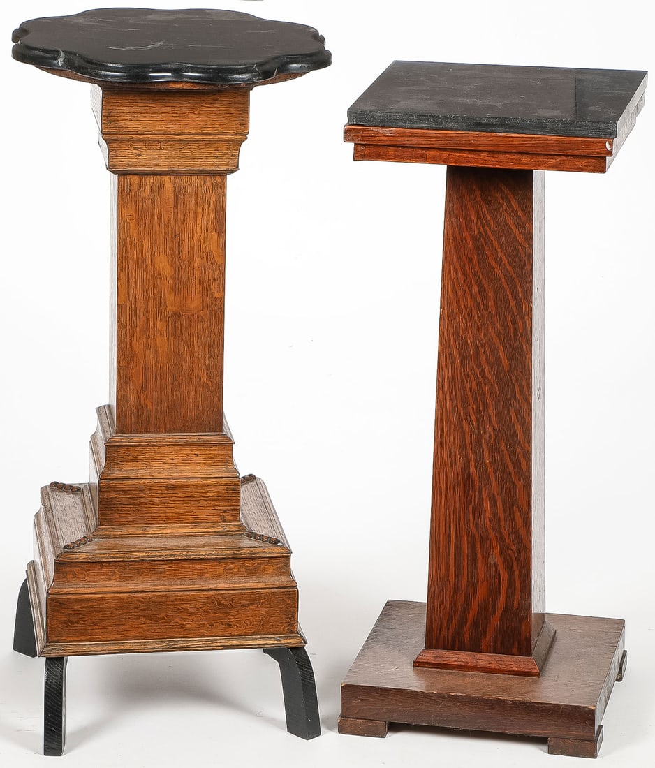 2 MARBLE TOP OAK PEDESTAL STANDS: 2 MARBLE TOP OAK PEDESTAL STANDS. Comprising a pair of square oak pedestal stands, one with scalloped marble top, the other with a square marble top. Height 32 inches and 29.75 inches.SHIPPING NOTICE:
