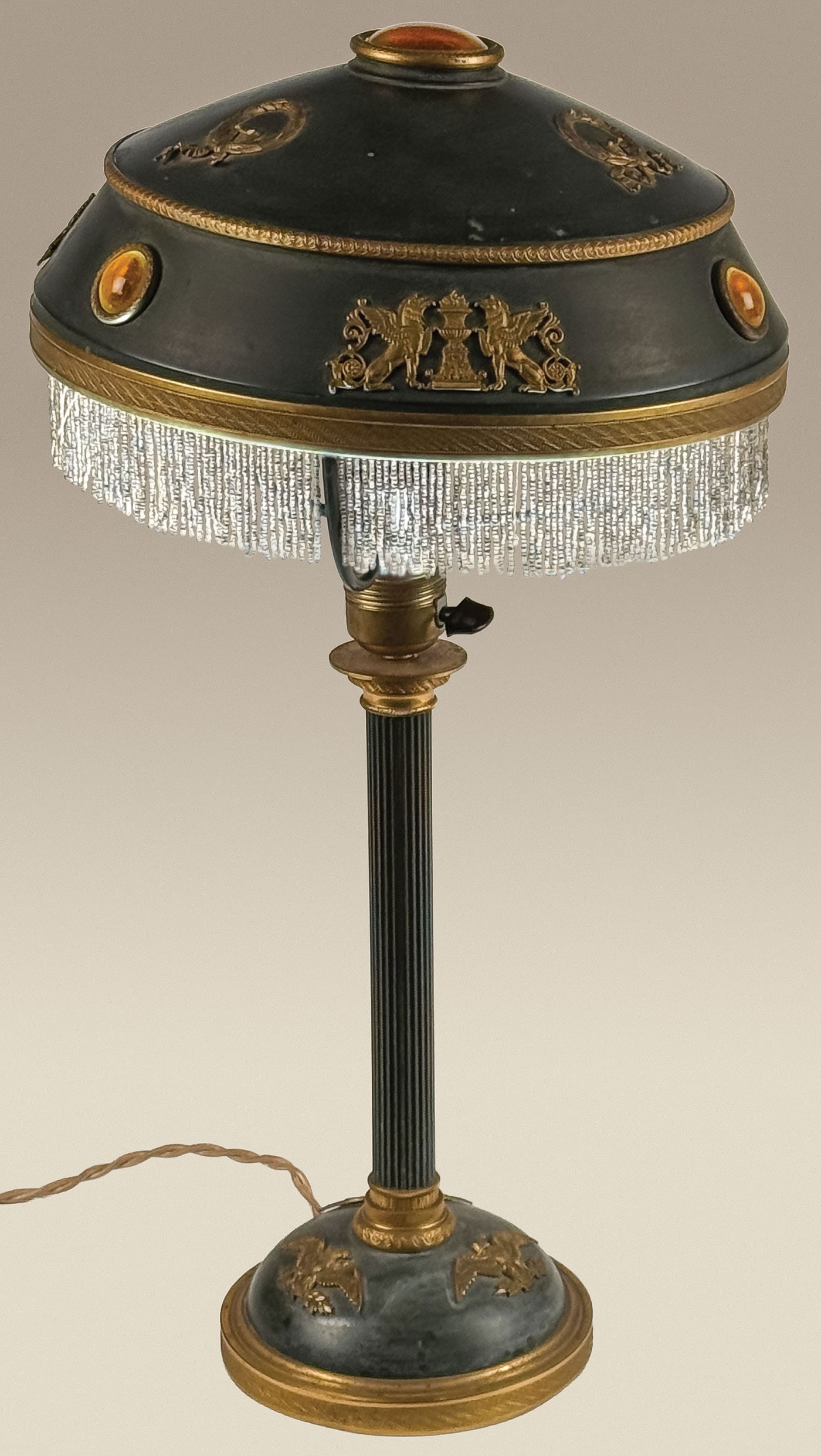 FRENCH POLYCHROME, ORMOLU & JEWELED TABLE LAMP: FRENCH POLYCHROME, ORMOLU & JEWELED TABLE LAMP. The polychrome green domed base with gilt-engraved banding set with a fluted stem supporting a green polychrome domed shade with engraved gilt banding,