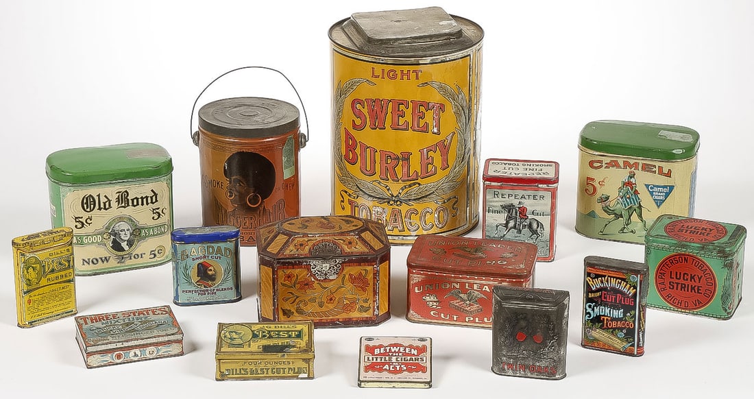15 GOOD VINTAGE TOBACCO ADVERTISING TINS: 15 GOOD VINTAGE TOBACCO ADVERTISING TINS. Comprising 14 advertising tins including a large B. Leidersdorf Co. "Nigger Hair" tin, along with examples for Lucky Strike, Camel, Sweet Burley, J.G. Dill's,