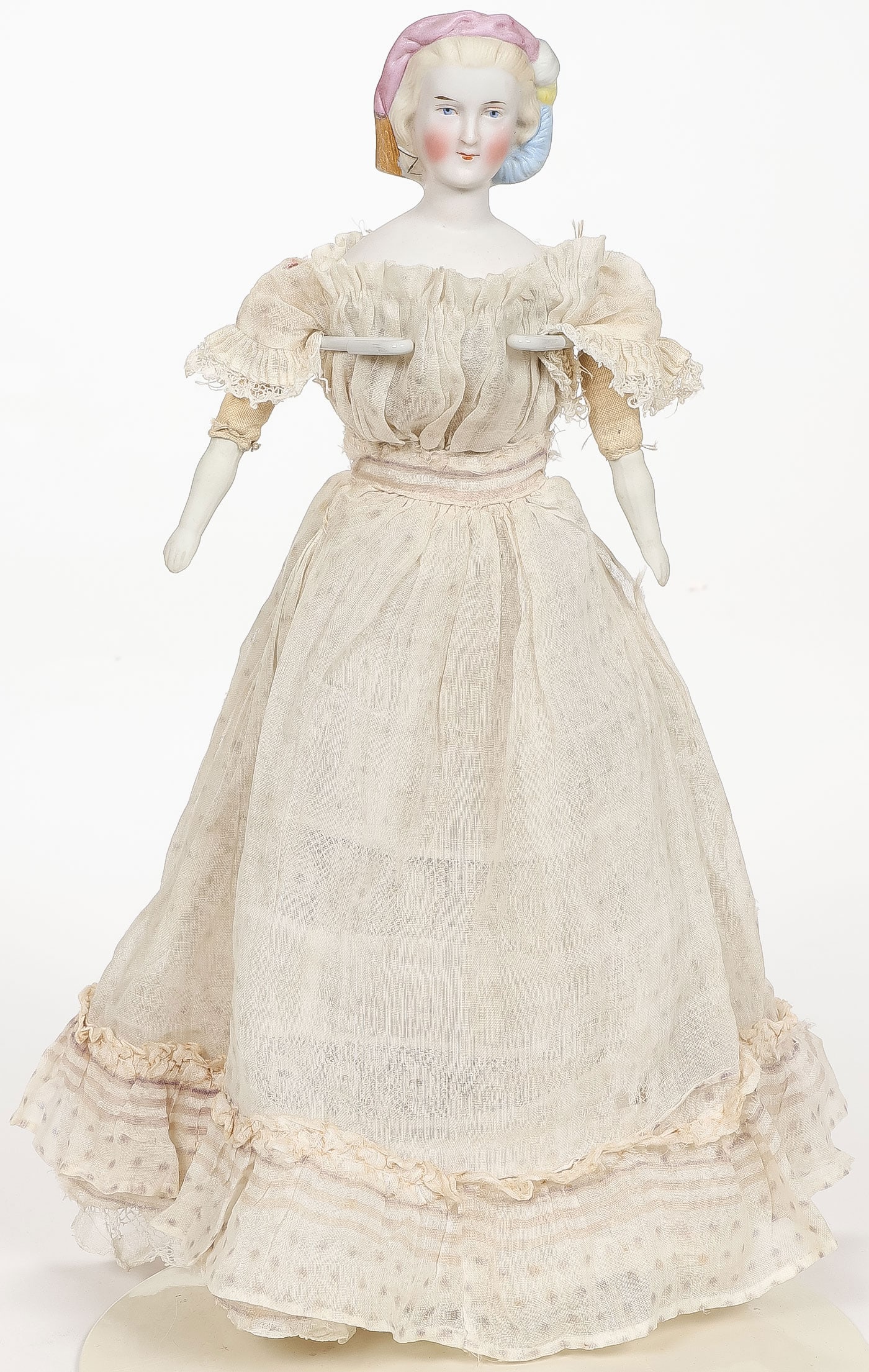 EMPRESS EUGENIE PARIAN DOLL: EMPRESS EUGENIE PARIAN DOLL. Comprising a charming Empress Eugenie Parian bisque doll with pink and blue snood, probably ABG. Height 11.5 inches (29.21cm).SHIPPING NOTICE:If you are not using the Li