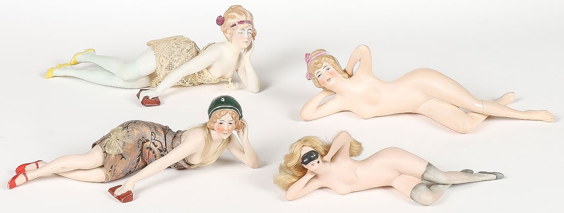 4 BISQUE BATHING BEAUTIES: 4 BISQUE BATHING BEAUTIES. Each finely modeled: one with a black Venetian mask and blond human hair wig; two others with cloth clothing; and another entirely nude reclining figure with repaired leg. G