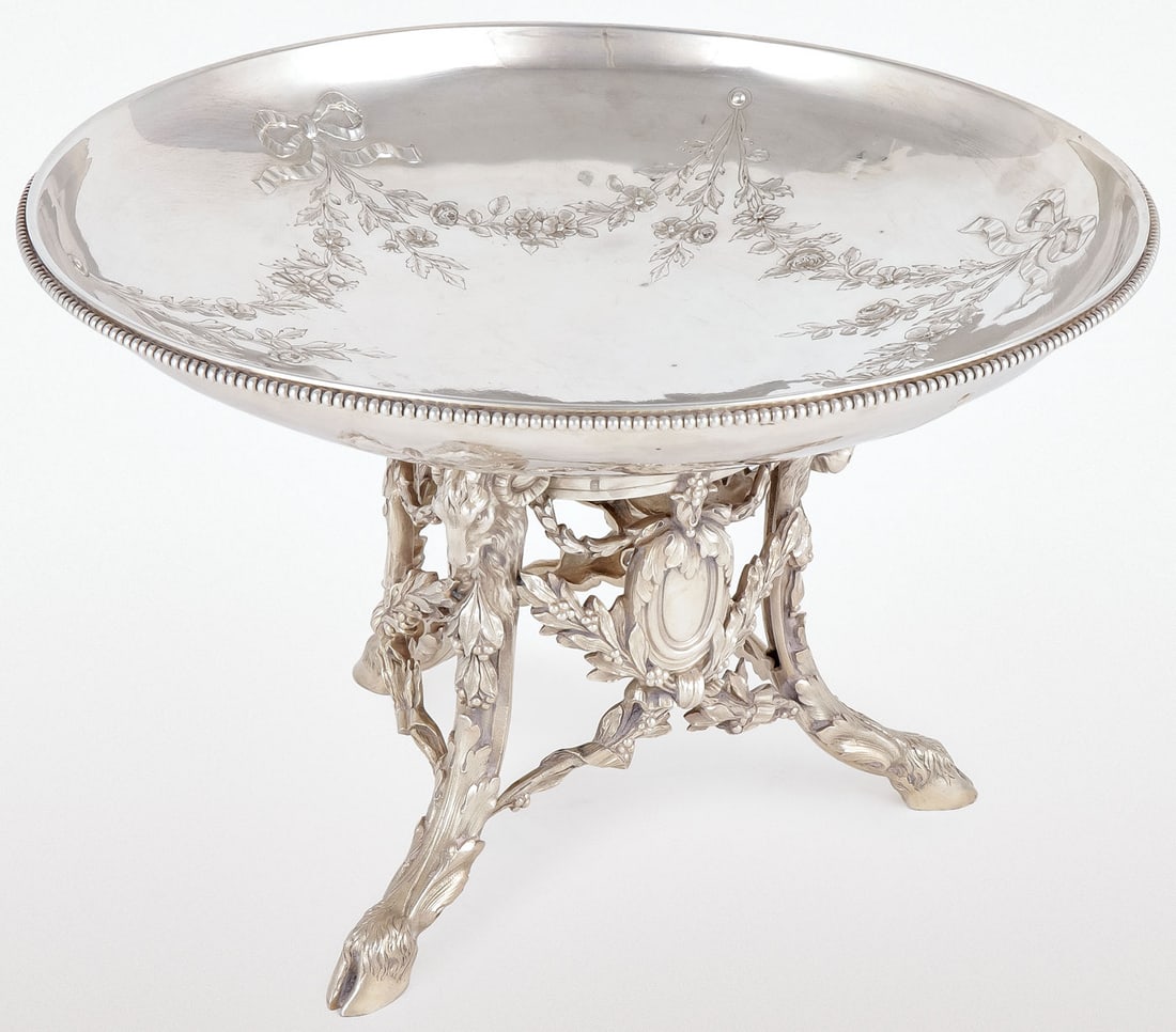 LARGE RUSSIAN SILVER COMPOTE, SAZIKOV, 1851.: Comprising a large, heavy and finely crafted impressive silver compote. On three hooved legs terminating with rams heads connected by laurel stretchers, swags and medallions. The bowl with beaded rim
