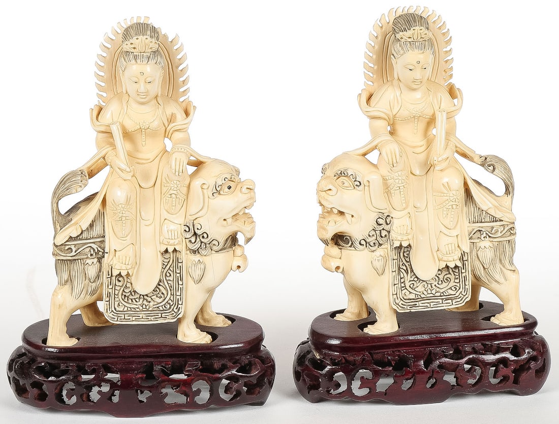 PAIR OF CHINESE CARVED FIGURES, QING: PAIR OF CHINESE CARVED FIGURES, QING. Comprising a pair of finely carved figures, each depicting Guanyin sitting aside a Qilin, carved in full round of good proportions and anatomy with deep folds and