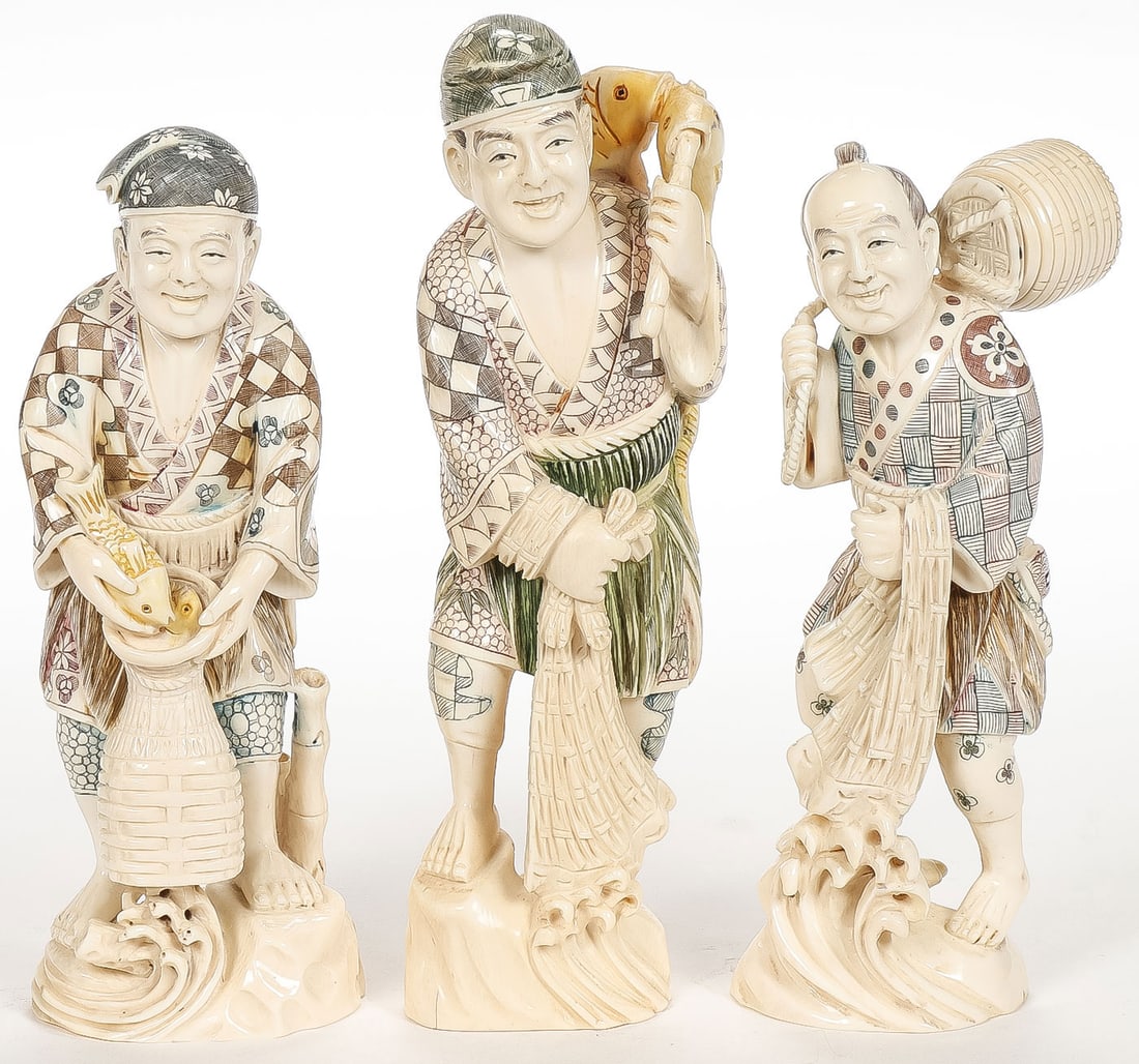 3 JAPANESE CARVED OKIMONO, MEIJI: 3 JAPANESE CARVED OKIMONO, MEIJI. Comprising three finely carved and tinted okimonos modeled as a fisherman and his son, each in full round with excellent detail and tinted highlights, each with inset