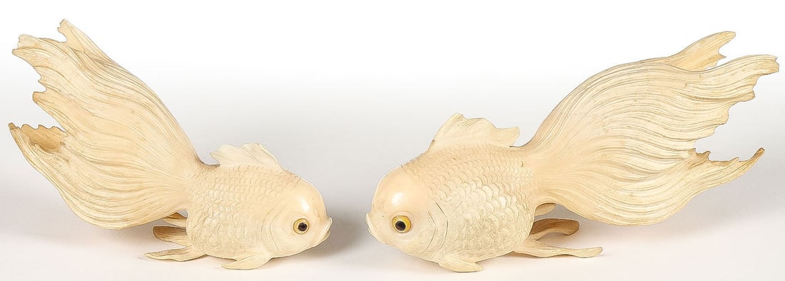 PR OF CHINESE CARVED GOLDFISH, QING: PR OF CHINESE CARVED GOLDFISH, QING. Both realistically and finely carved, of good anatomy and proportions, with mother-of-pearl eyes and conforming boxes. Greatest length 5.75 inches (14.5cm). NO INT