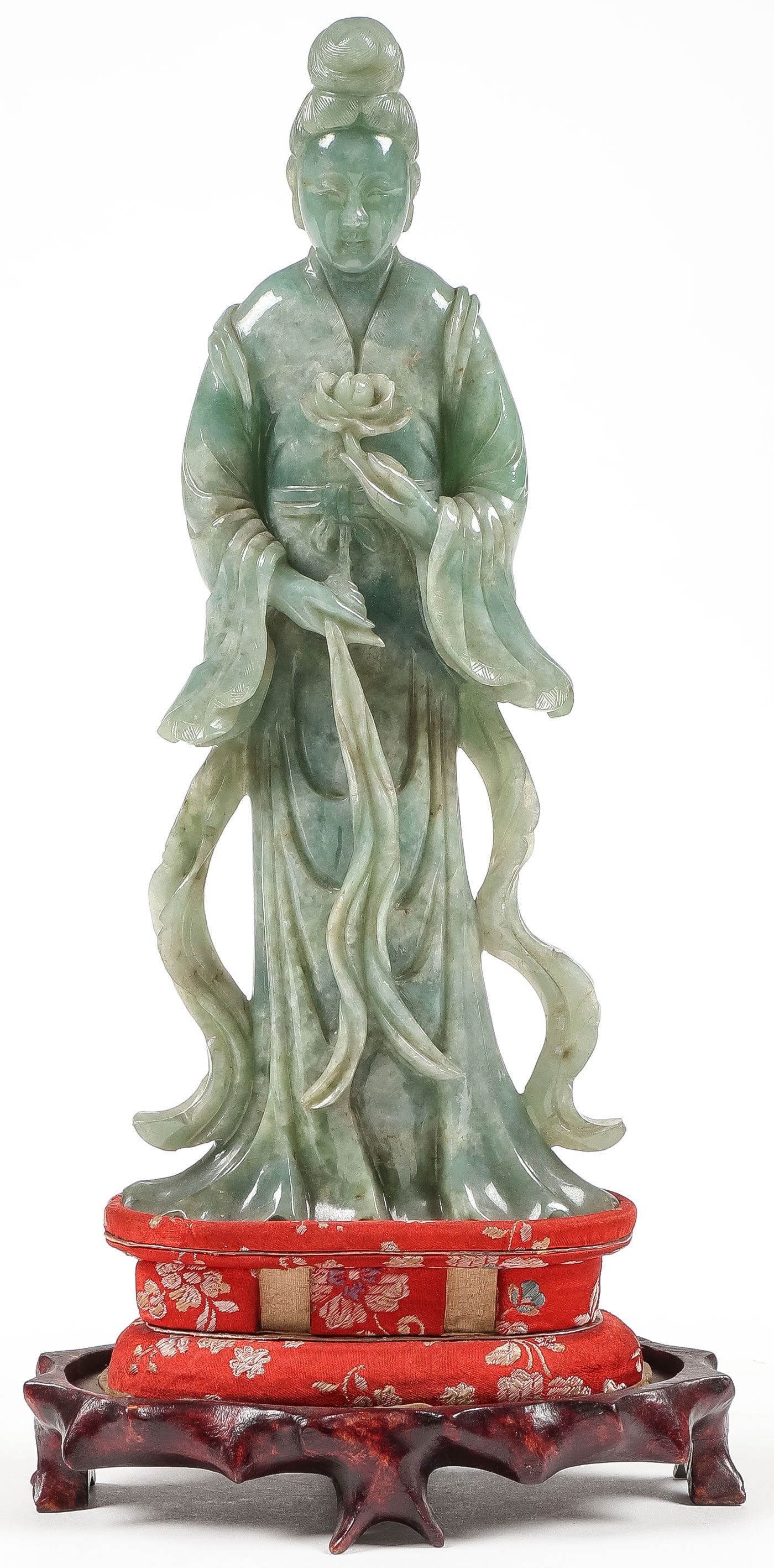 FINE CHINESE CRAVED JADE GUANYIN, 19TH C: FINE CHINESE CRAVED JADE GUANYIN, 19TH C. Exceptionally carved in full round, holding a lotus flower with flowing robes and sash, with deeply carved folds, a sensitively carved face, and finely detail