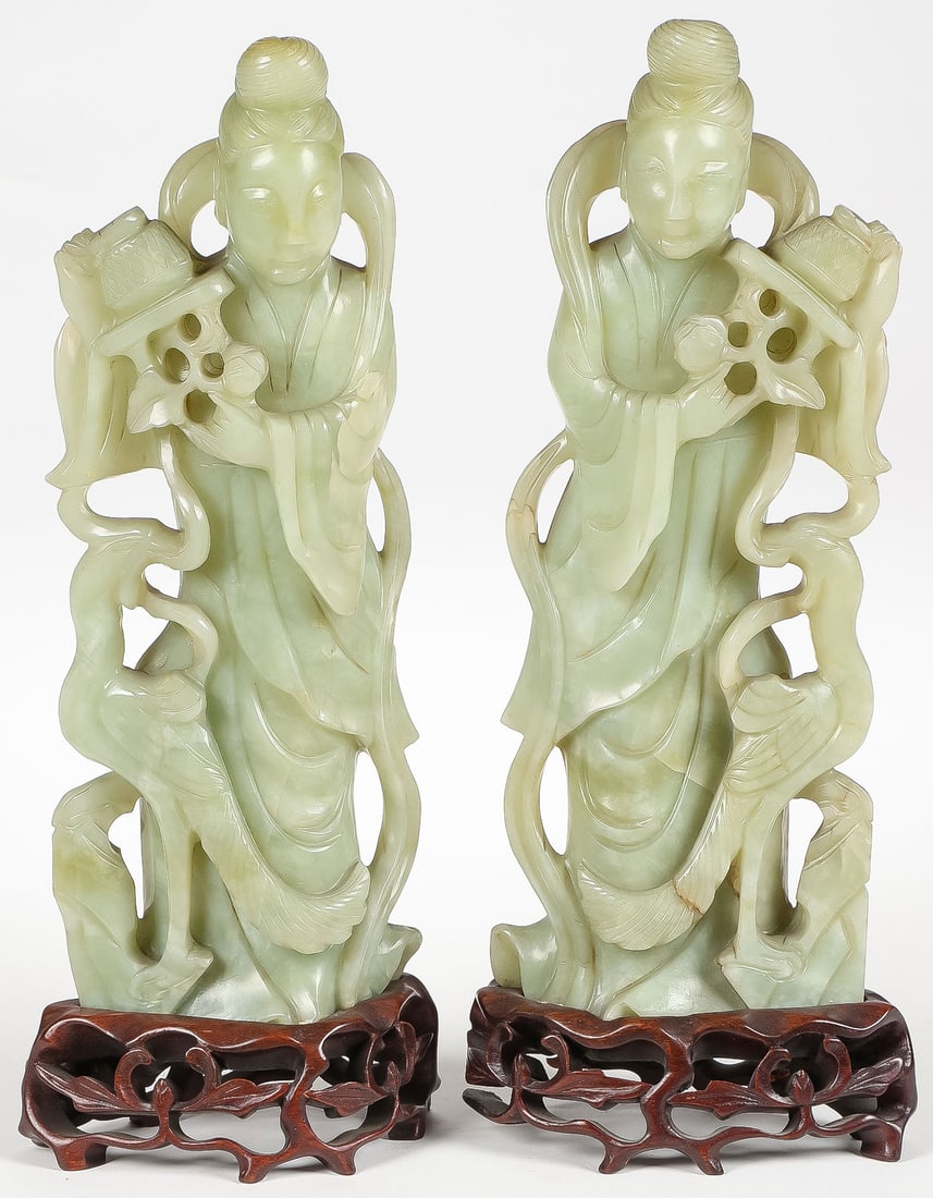 PAIR CHINESE CARVED JADE FIGURES, QING: PAIR CHINESE CARVED JADE FIGURES, QING. Comprising a pair of large opposing pierced-carved jade immortals, probably Xiwangmu, each carved in full round with flowing robes and good detail, and each re