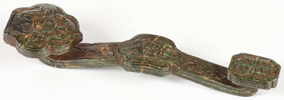 CHINESE CARVED HARDSTONE RUYI SCEPTER: CHINESE CARVED HARDSTONE RUYI SCEPTER. Of traditional form, displaying various characters. Length 9 inches (23cm).SHIPPING NOTICE:If you are not using the Live Auctioneers Live Ship program, Jackso