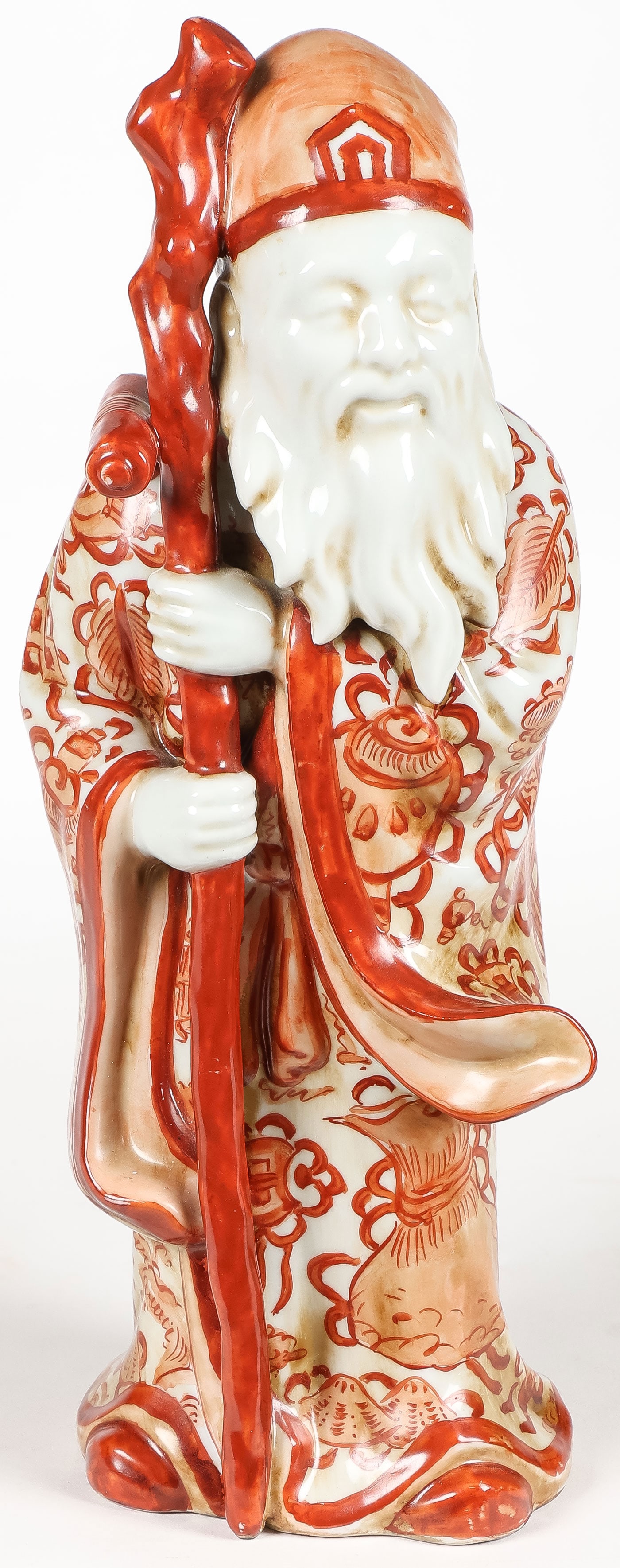 JAPANESE KUTANI PORCELAIN FIGURE: JAPANESE KUTANI PORCELAIN FIGURE. Comprising an attractive and finely mottled and decorated figure of Jurojin, height 12.75 inches (32.39cm).SHIPPING NOTICE:If you are not using the Live Auctioneers