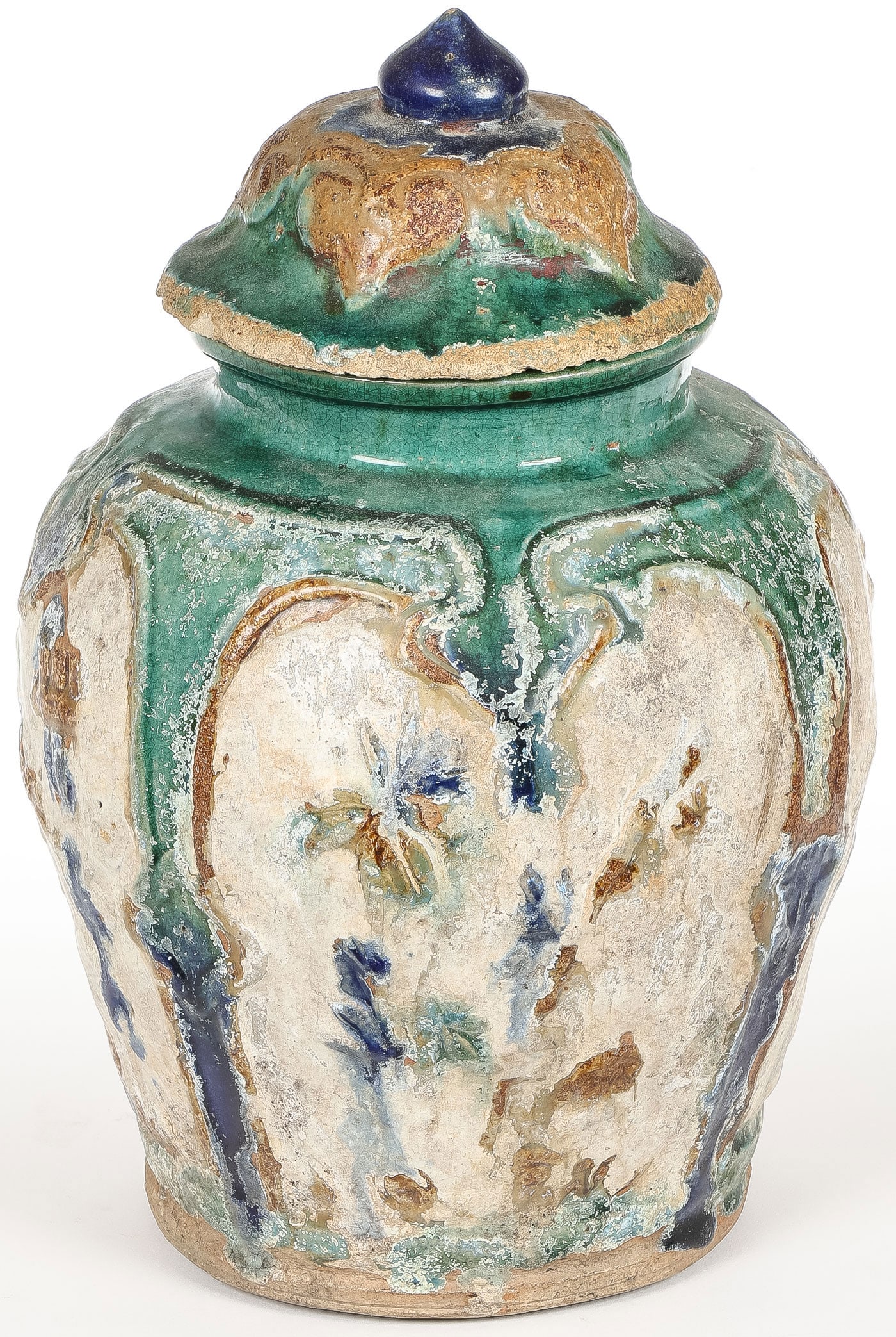 CHINESE GLAZED COVERED JAR, QING: CHINESE GLAZED COVERED JAR, QING. Comprising a traditional covered ginger jar with molded and glazed decorated reserves, as shown. Height 12 inches (30cm).SHIPPING NOTICE:If you are not using the L