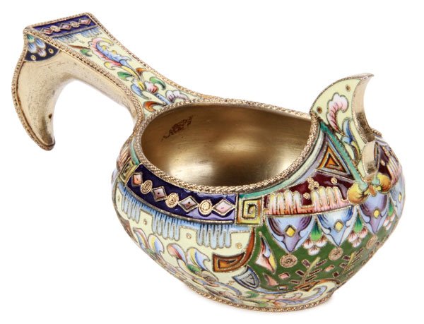 RUSSIAN SILVER ENAMEL KOVSH, 6TH ARTEL, 1908-1917: A RUSSIAN SILVER-GILT AND SHADED ENAMEL KOVSH, 6TH ARTEL, MOSCOW,1908-1917. Of traditional form, with hook handle, raised prow and rope twist borders, the sides and handle enameled in geometric motifs