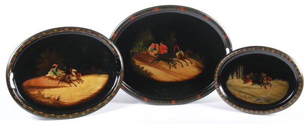 3 RUSSIAN LACQUER METAL TRAYS, VISHNIAKOV, 19TH C: THREE RUSSIAN LACQUER METAL TRAYS, VISHNIAKOV, 19TH CENTURY. All of oval form, each painted with a troika scene and with decorated borders. The verso of each with the Vishniakov mark. Greatest length 