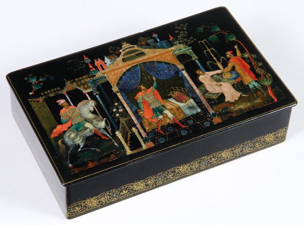 AN EARLY RUSSIAN PALEKH LACQUER BOX, CIRCA 1930: AN EARLY RUSSIAN PALEKH LACQUER BOX, CIRCA 1930. Of rectangular form, the hinged lid exquisitely painted with a fairy tale scene. Trace signature and date lower right. The sides ornately banded in gol