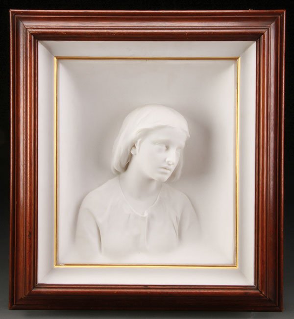 CARVED MARBLE RELIEF, ERASTUS PALMER, AMERICAN: ERASTUS DOW PALMER(American 1817-1904) Portrait of a Young Girl Carved relief marble plaque Inscribed lower right "ED Palmer SC", and with inscribed date on verso "1864" Height 14.25 inches (36.5 cm),