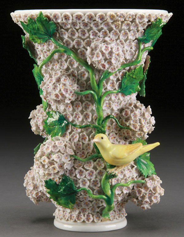 MEISSEN SCHNEEBALLEN PORCELAIN VASE, 19TH CENTURY: A MEISSEN SCHNEEBALLEN (SNOWBALL) PORCELAIN VASE, 19TH CENTURY. Overlaid with applied flowers, leafy vines, and two birds. Blue glazed crossed sword mark on base. Some restoration. Height 7.75 inches