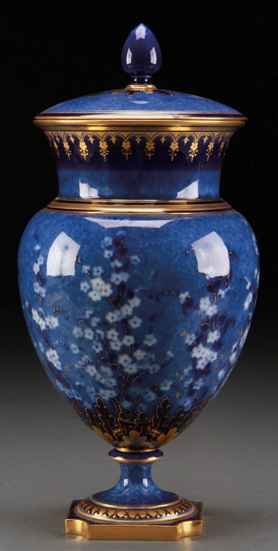 SEVRES FRENCH PORCELAIN BLUE JASPER GROUND URN: A VERY FINE SEVRES FRENCH PORCELAIN BLUE JASPER GROUND LIDDED URN, CIRCA 1887. Of ovoid form, decorated with white floral blossoms and gilt. Probably by Maximilien Ferdinand Merigot. Height 13 inches 