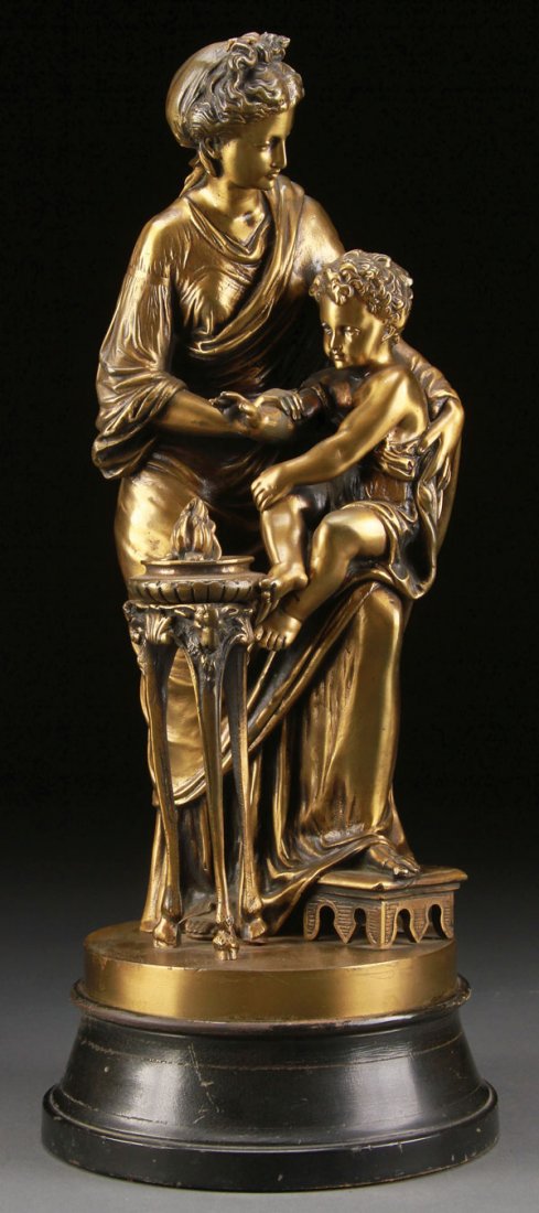 BRONZE, AFTER LOUIS SAUVAGEAU, FRENCH: After LOUIS SAUVAGEAU(French b. 1822-)Femme et Amour, Le Feu Bronze with gilt patinaInscribed on base "Sauvageau"Height 16.5 inches (42 cm), overall height including base 19.25 inches (48.9 cm)