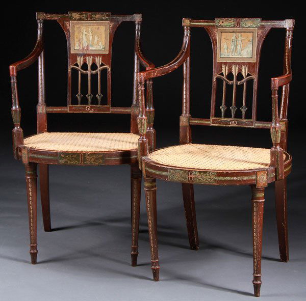 ENGLISH ADAM POLYCHROME CANED ARM CHAIRS, PAIR: A PAIR OF ENGLISH ADAM POLYCHROME AND CANED ARM CHAIRS, EARLY 19TH CENTURY. Each with a painted Neo-classic scene on backsplat above a carved bow and three arrows. Original finish and decoration. Heig