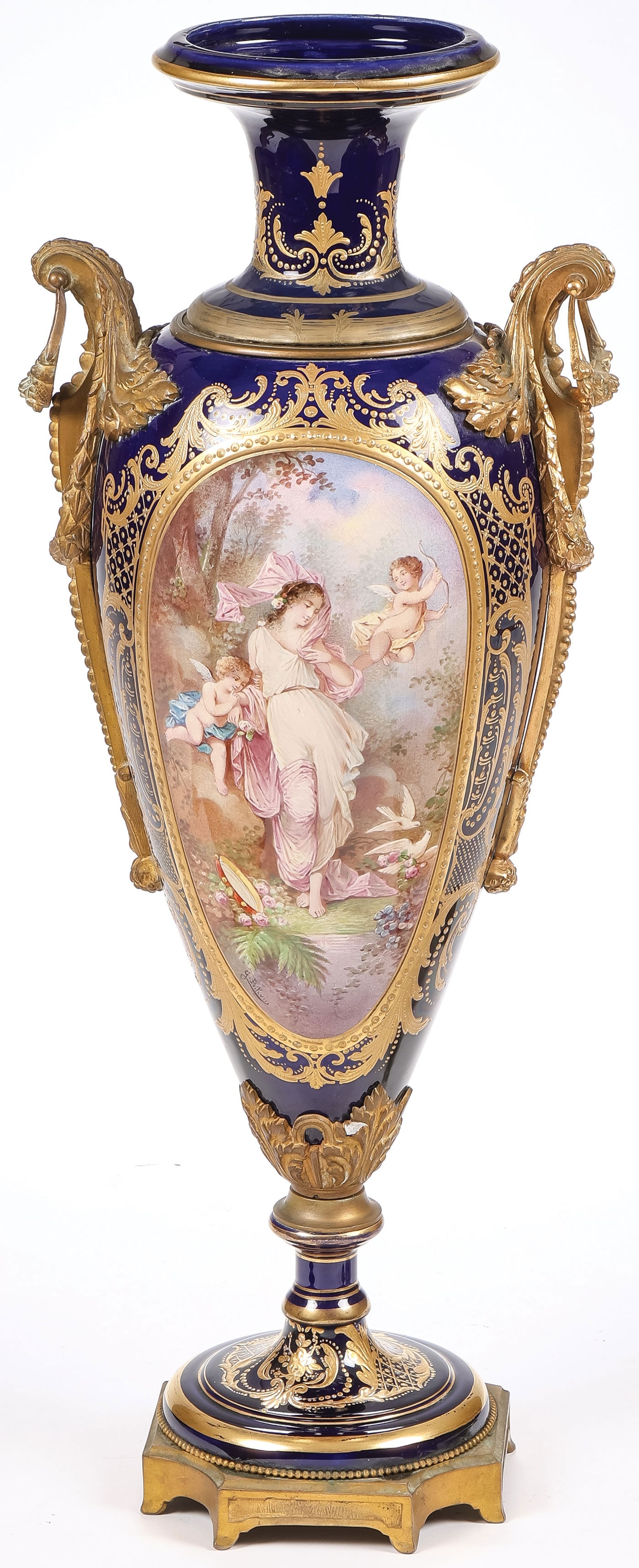 IMPRESSIVE ARTIST SIGNED URN: IMPRESSIVE ARTIST SIGNED URN. Comprising a large and impressive Sevres or Sevres-style cobalt, gilt, and ormolu-mounted urn with ornate gilt bronze shoulder-mounted handles, the front with finely pain