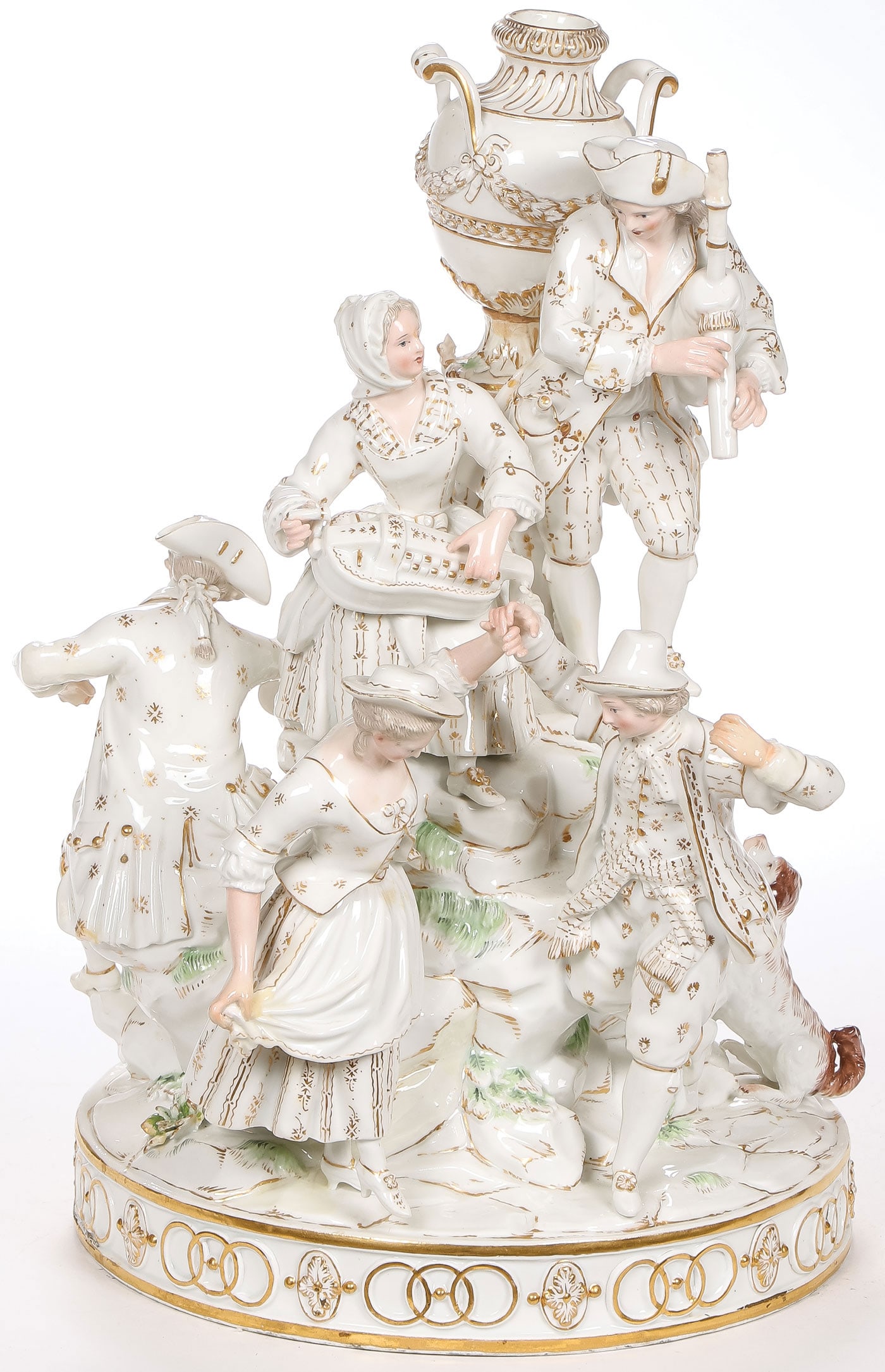 IMPRESSIVE MEISSEN FIGURAL GROUP: IMPRESSIVE MEISSEN FIGURAL GROUP. Comprising a large and impressive finely modeled and decorated group of figures making merry atop a rocky outcrop surmounted with an urn. Underside with blue crossed 