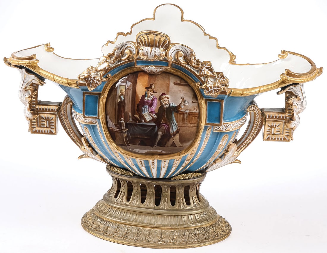 MASSIVE PORCELAIN CENTERPIECE, 19TH C: MASSIVE PORCELAIN CENTERPIECE, 19TH C. Comprising a large and impressive hand painted and gilt decorated centerpiece porcelain bowl, Sevres or Sevres style, 19th century. Resting on an oval pierced br
