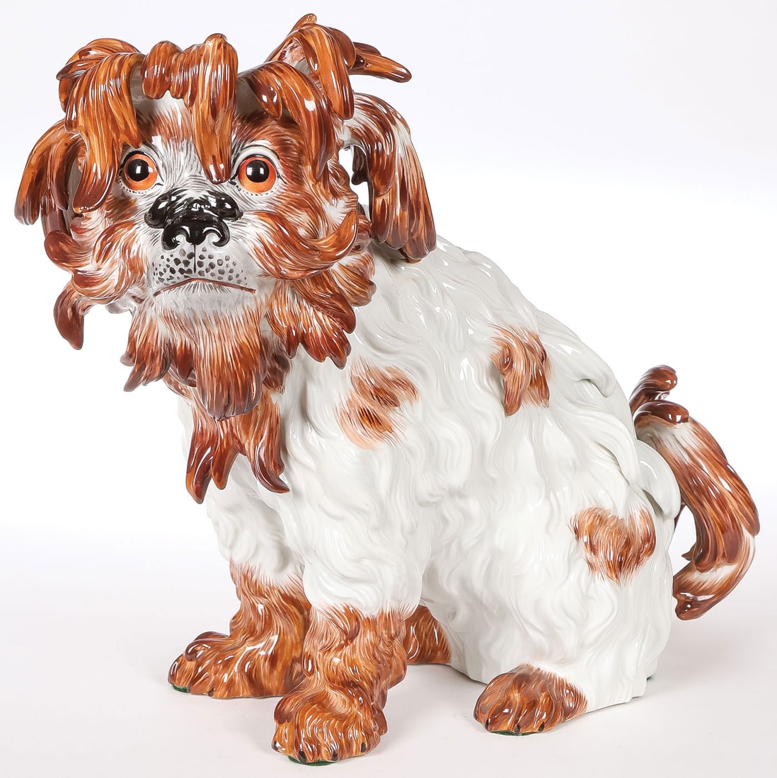 MEISSEN PORCELAIN BOLOGNESE DOG: MEISSEN PORCELAIN BOLOGNESE DOG. Comprising a finely modeled and painted Meissen Bolognese dog. Underside with blue underglaze cross swords mark. Height 9.5 inches (24cm). SHIPPING NOTICE: If you are