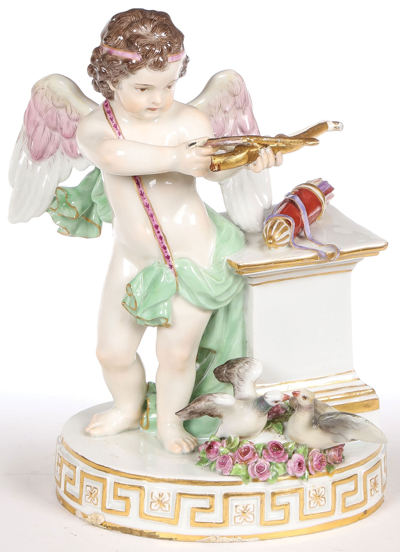 MEISSEN PORCELAIN CUPID: MEISSEN PORCELAIN CUPID. Finely modeled and painted, resting on a gilt Greek key-banded oval base, the underside with blue underglaze crossed swords, and incised model number G. 30 and impressed #51. 