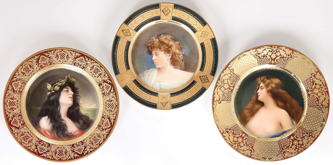 3 ARTIST SIGNED VIENNA PORTRAIT PLATES, C. 1900: 3 ARTIST SIGNED VIENNA PORTRAIT PLATES, C. 1900. Comprising three very finely painted and artist-signed Viennese porcelain cabinet plates. From left to right: Daphne, with opulently decorated raised g