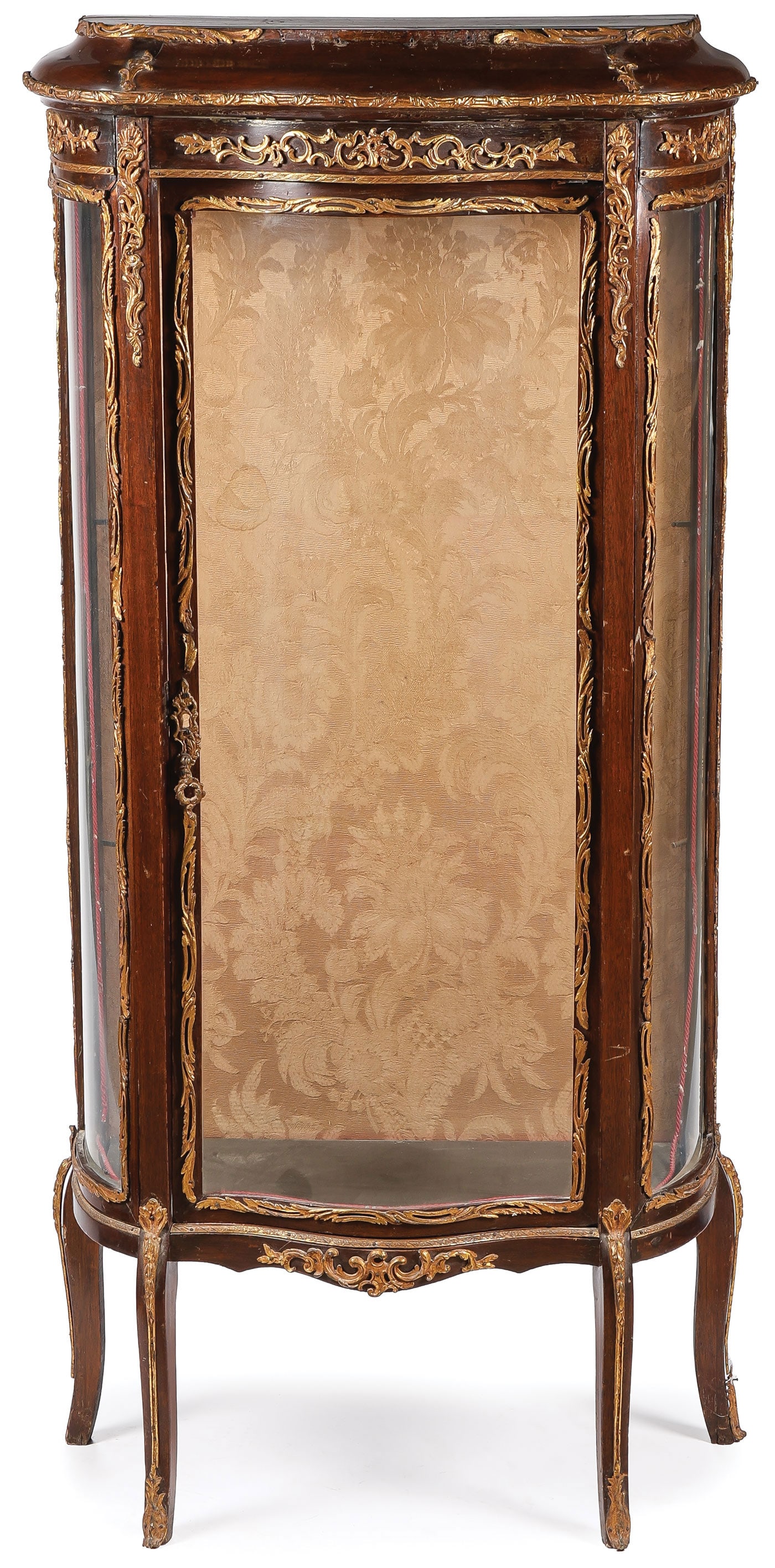 IMPRESSIVE LOUIS XV VITRINE: IMPRESSIVE LOUIS XV VITRINE. Comprising an impressive mahogany display cabinet with curved glass front and sides, and ornate chased ormolu decoration in floral and foliate motifs, resting on four