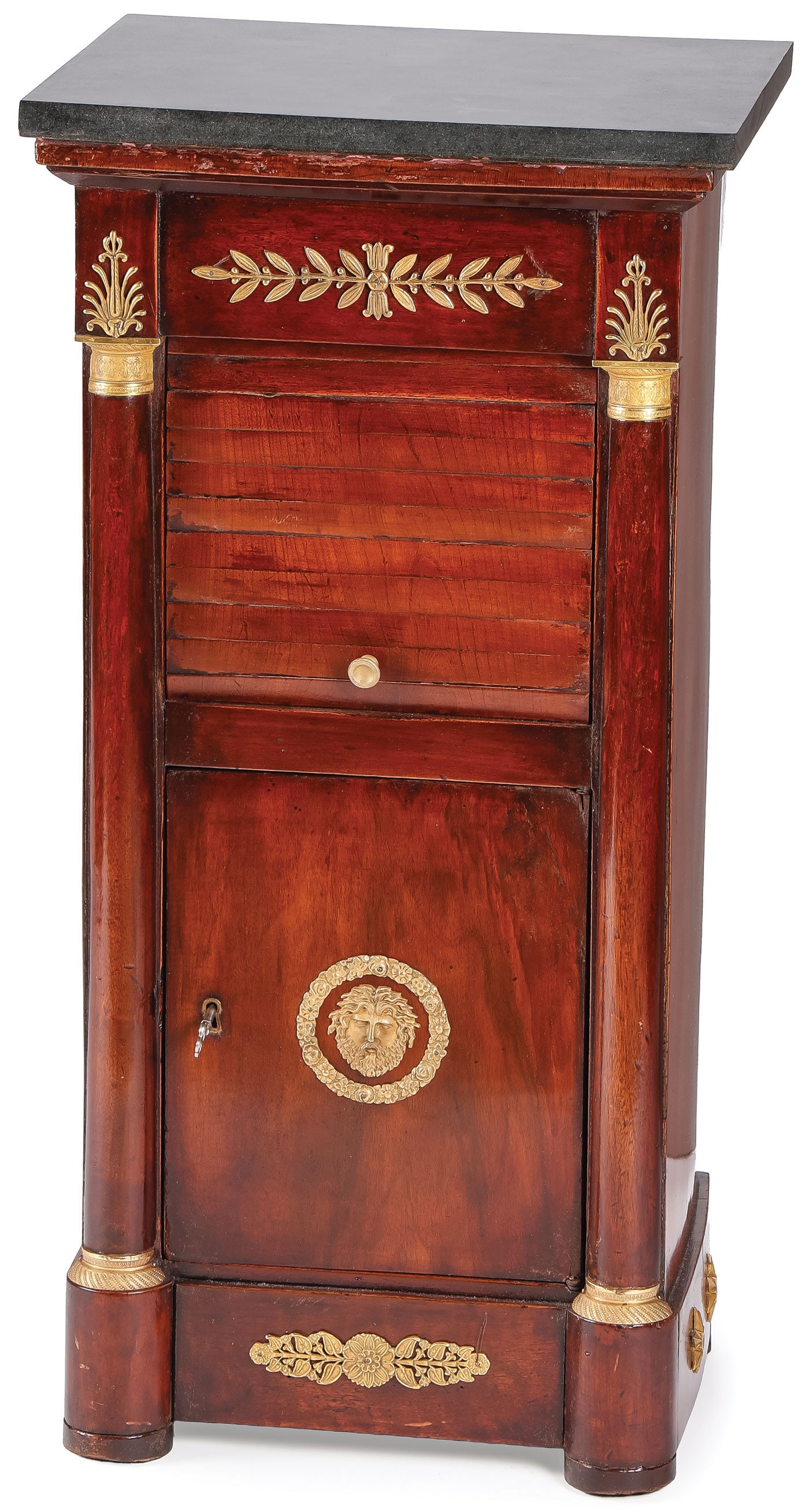 PETITE FRENCH EMPIRE MAHOGANY NIGHTSTAND: PETITE FRENCH EMPIRE MAHOGANY NIGHTSTAND. Comprising a petite and attractive French Empire mahogany and ormolu decorated nightstand with tambour door above a single swing-out door with gilt-mounted