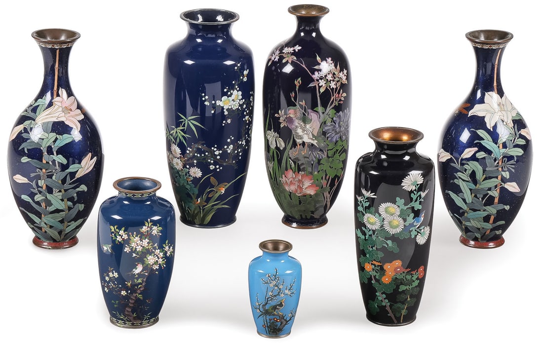 7 FINE JAPANESE CLOISONNE VASES, MEIJI: 7 FINE JAPANESE CLOISONNE VASES, MEIJI. Comprising seven individual vases, including a matching set decorated with lilies on a blue ground with goldstone-flecked decoration. Together with a large vase