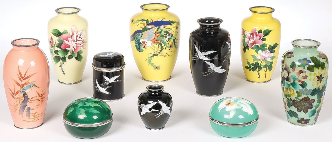 JAPANESE MUSEN ENAMEL GROUP: JAPANESE MUSEN ENAMEL GROUP. Comprising 9 Japanese Musen enamel vases and boxes as shown, two with Ando factory marks, one with Sato mark. Together with a plique-a-jour vase as shown. Greatest height 
