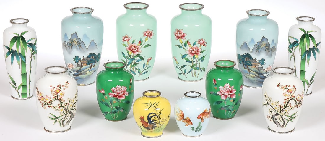 12 JAPANESE MUSEN CLOISONNE VASES: 12 JAPANESE MUSEN CLOISONNE VASES. Comprising five matching pairs and two solos as shown, with various decorative motifs including flowers, bamboo, mountain landscapes, goldfish, and a rooster. Greate