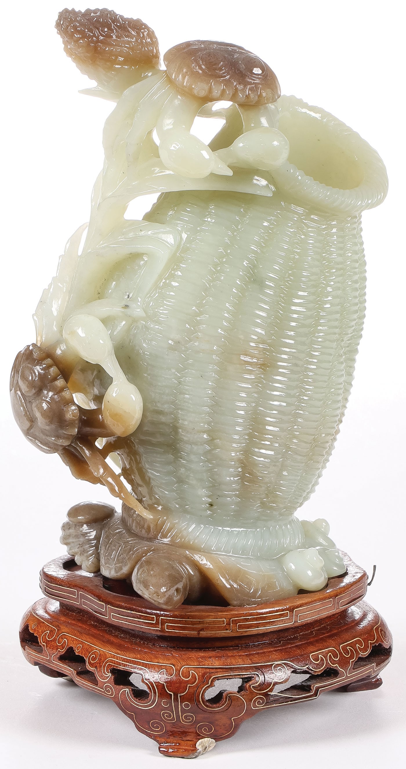 FINE CHINESE CARVED JADE BASKET VASE: FINE CHINESE CARVED JADE BASKET VASE. Comprising a finely carved jade basket-form vase resting on a sea turtle, with scuttling crabs, resting on a conforming wood stand with wire inlay. Greatest heigh