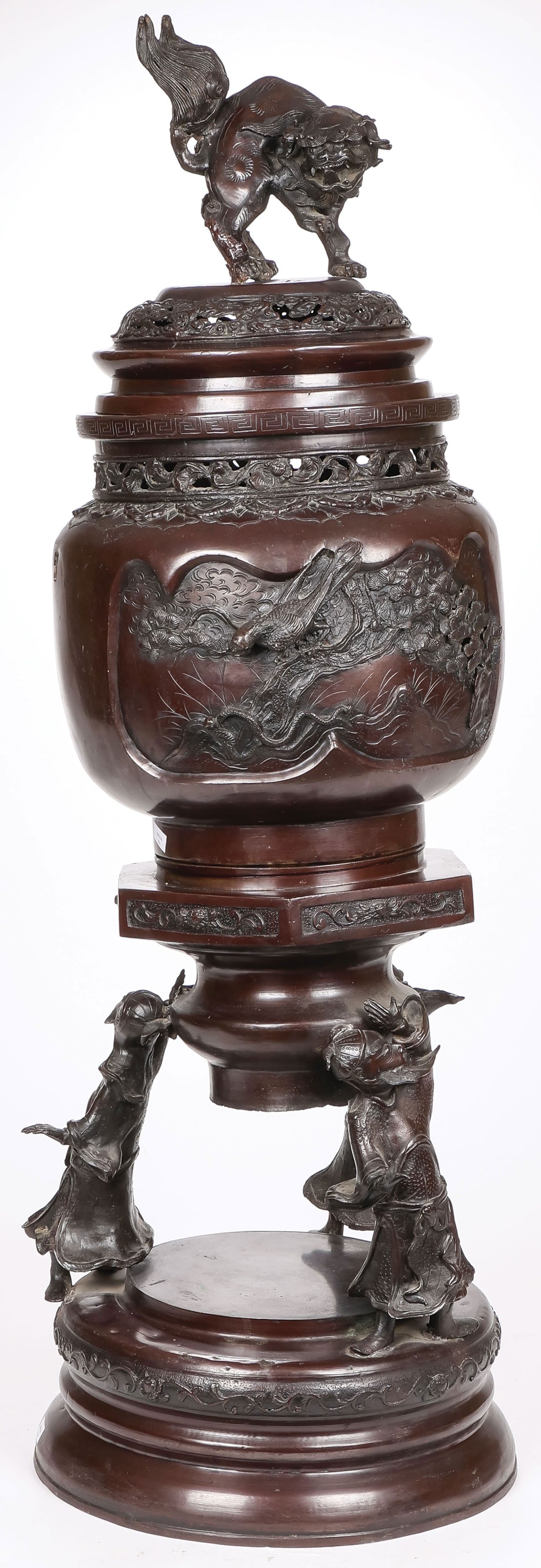 LARGE JAPANESE BRONZE KORO, MEIJI: LARGE JAPANESE BRONZE KORO, MEIJI. Comprising a large and impressive patinated bronze Koro, Meiji, the base with three figures supporting the large urn, decorated in high relief with songbirds in a la