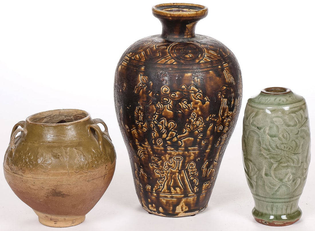 CHINESE CERAMICS GROUP: CHINESE CERAMICS GROUP. Comprising three partially glazed vessels, including a jug with lug handles and raised decoration, a large Ming-style incised baluster-form jug with dark brown glaze, and a car