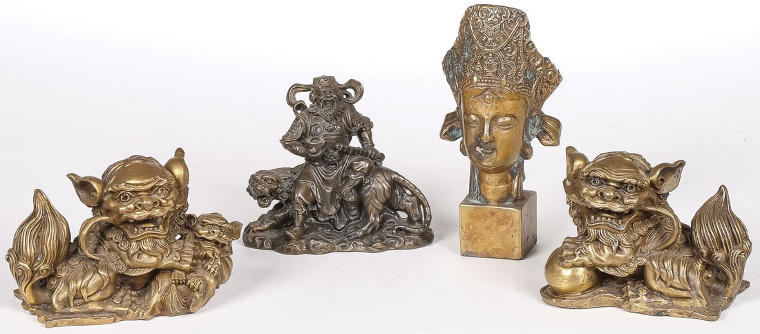 4 PC CHINESE BRONZE GROUP: 4 PC CHINESE BRONZE GROUP. Comprising a pair of finely cast foo lions, one with cub, a finely sculpted and finely cast figure of Zhao Gong Ming resting on a tiger, and a Buddha head seal. Greatest