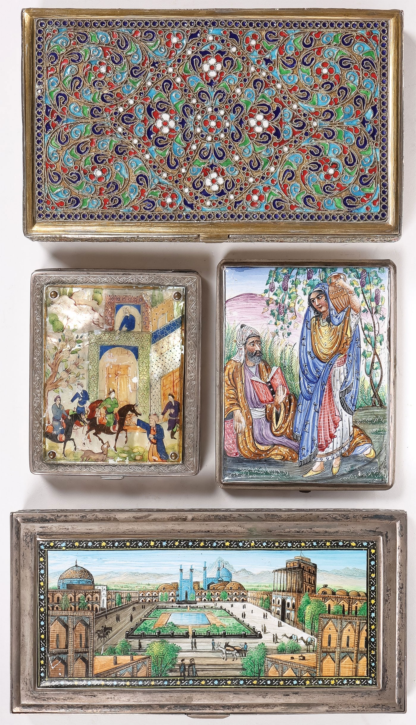 GOOD PERSIAN ENAMEL GROUP: GOOD PERSIAN ENAMEL GROUP. Comprising nine individual pieces, including a very fine silver-gilt and cloisonne enamel lidded box, the interior brightly gilded and with Arabic maker's marks, width 6.3 i